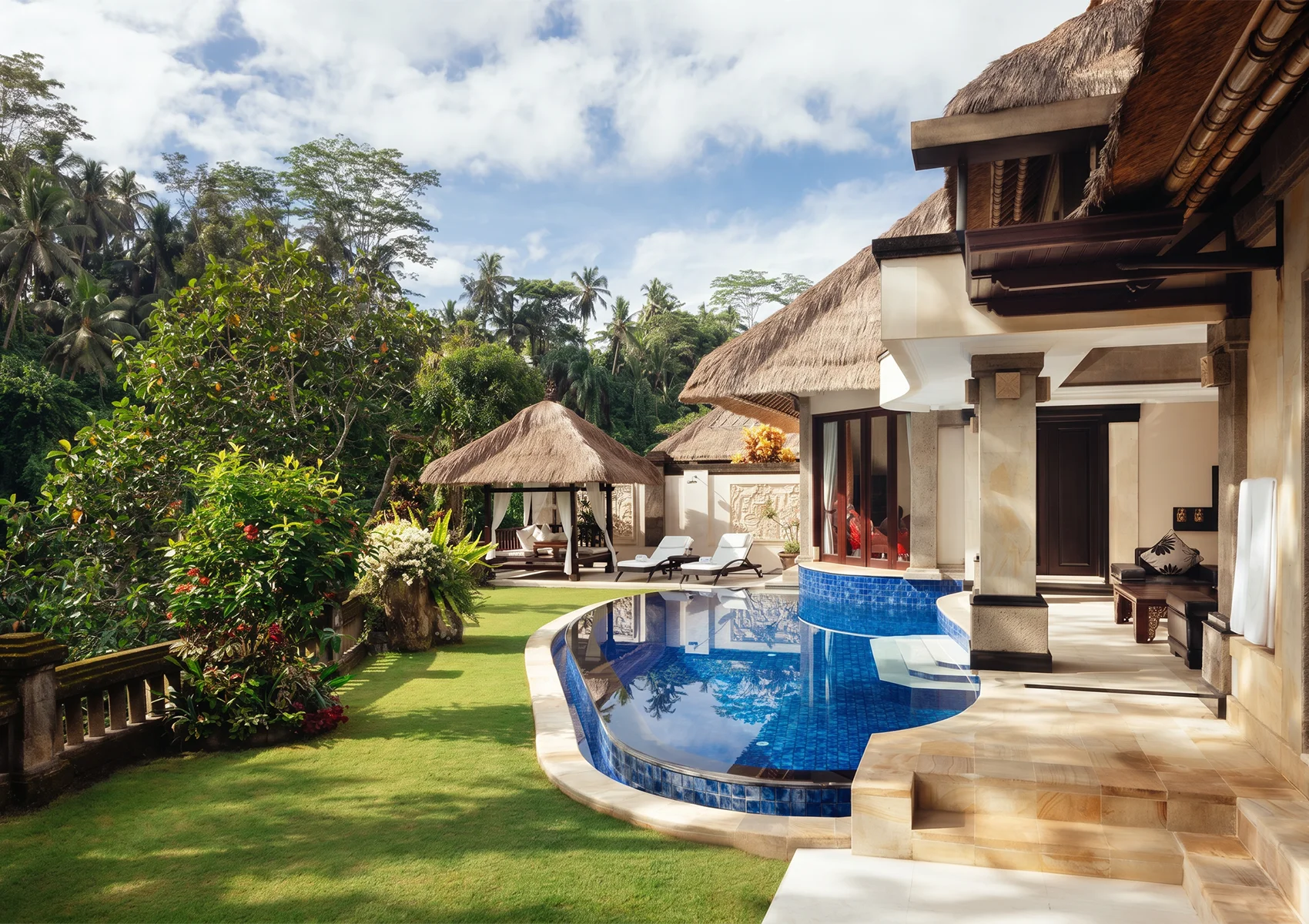 Luxury private pool villa at Viceroy Bali surrounded by lush tropical gardens, elegant Balinese architecture, and peaceful jungle scenery for a romantic couples escape in Ubud